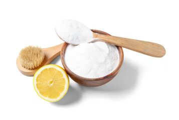 Fototapeta na wymiar Bowl of baking soda, cleaning brush and lemon on white background
