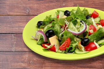 plate of fresh tasty salad with cheese