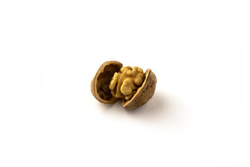 Walnut in an open shell on a white background.