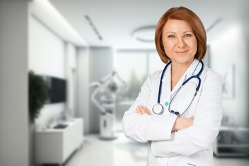 Young happy woman doctor in hospital