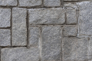 Tetris style granite block wall.