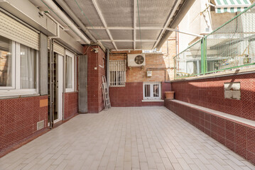 Courtyard of a house with white tile