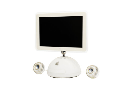 Los Angeles, California, USA - May 31, 2023:  Illustrative editorial photo of vintage Apple iMac G4 desktop computer with original speakers.  Isolated with cut out background.