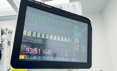 Hospital monitor symbolizes vital signs monitoring, patient health assessment, medical diagnostics,...