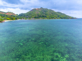 Fototapeta premium Aerial view of Anse Madge beach on a cloudy day
