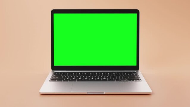 Modern Laptop in front of skin colored backdrop with green screen on display for content placement. Created with generative AI.