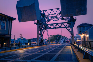 The Mystic River Bascule Bridge at Sunrise and downtown street in Connecticut