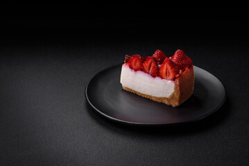 Delicious fresh cheesecake with strawberries, syrup and mascarpone cheese