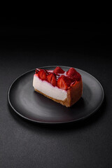 Delicious fresh cheesecake with strawberries, syrup and mascarpone cheese