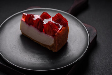 Delicious fresh cheesecake with strawberries, syrup and mascarpone cheese