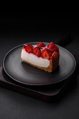 Delicious fresh cheesecake with strawberries, syrup and mascarpone cheese