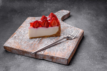 Delicious fresh cheesecake with strawberries, syrup and mascarpone cheese