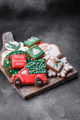 Beautiful colored Christmas gingerbread cookies for the design and decoration