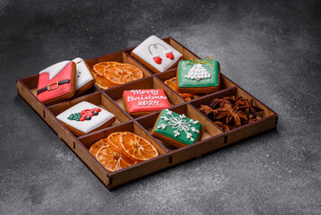Beautiful colored Christmas gingerbread cookies for the design and decoration