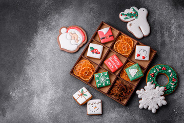Beautiful colored Christmas gingerbread cookies for the design and decoration