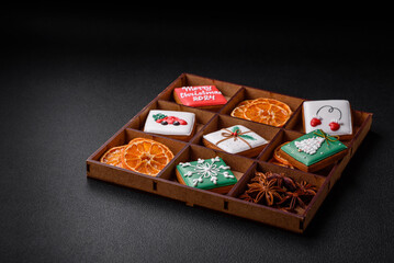 Beautiful colored Christmas gingerbread cookies for the design and decoration