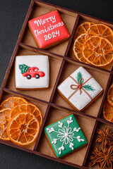 Beautiful colored Christmas gingerbread cookies for the design and decoration