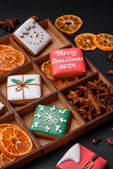 Beautiful colored Christmas gingerbread cookies for the design and decoration