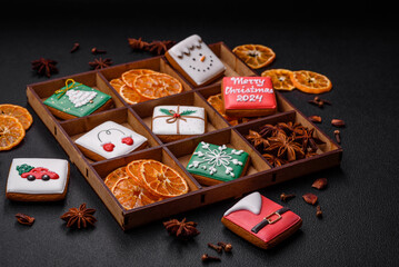 Beautiful colored Christmas gingerbread cookies for the design and decoration