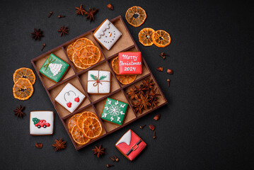 Beautiful colored Christmas gingerbread cookies for the design and decoration