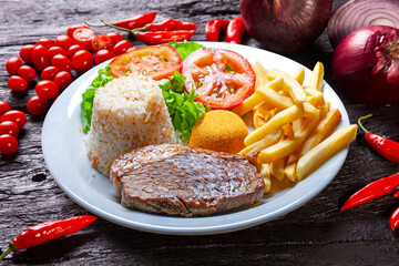 Roasted picanha steak, rice, salad, farofa, fries