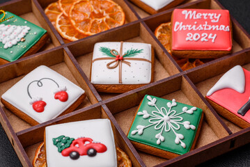 Beautiful colored Christmas gingerbread cookies for the design and decoration