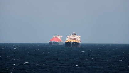 Two large LNG tanker at anchor off the dutch coast.