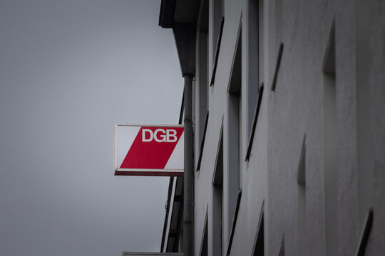 DUSSELDORF, GERMANY - NOVEMBER 7, 2022: Selective blur on DGB logo on office in Dusseldorf. DGB, Deutscher Gewerkschaftsbund, is a german trade union confederation, umbrella for 8 trade union organiza