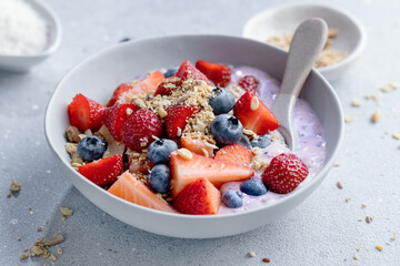 Muesli with fruits served in bowl