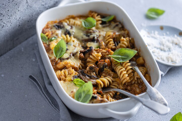 Oven baked pasta with vegetables and mushrooms