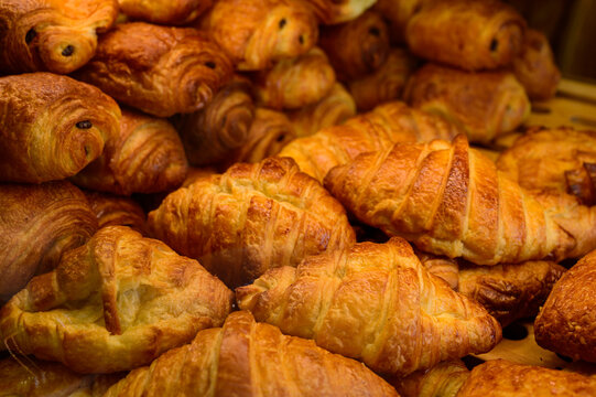 Butter puff croissants on display in artisanal bakery in Paris, France