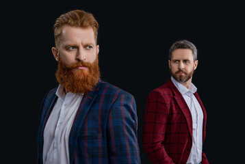 Obraz premium photo of ambitious men in formalwear suits. men in formalwear isolated on black.