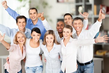 Group of smart young businesspeople in an office.