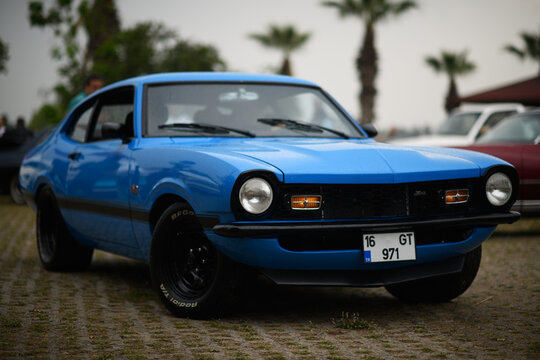 Rain-Soaked Blue 1971 Ford Maverick.