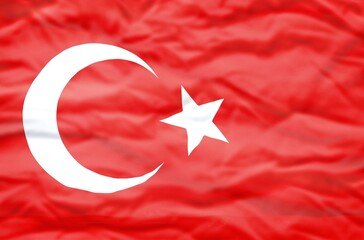 Obraz premium Turkey flag on a wavy background. Wavy flag of Turkey fills the frame.
