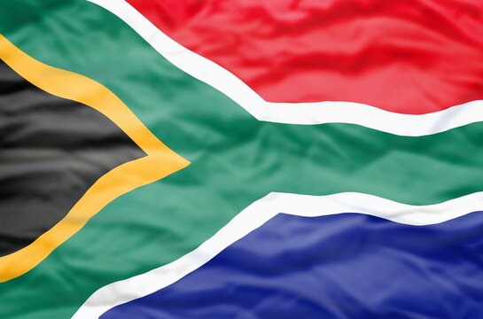 South Africa flag on a wavy background. Wavy flag of South Africa fills the frame.