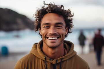 Medium shot portrait photography of a cheerful man in his 20s that is wearing a cozy sweater against a surfing competition at a tropical beach background .  Generative AI