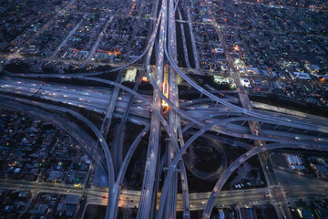Night aerial view of the 110 and 105 freeway interchange south of downtown Los Angeles in Southern...