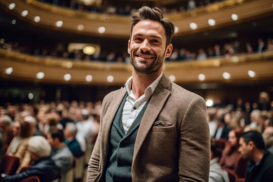 Medium shot portrait photography of a pleased man in his 30s that is wearing a chic cardigan against a beautiful symphony orchestra performance in a concert hall background .  Generative AI