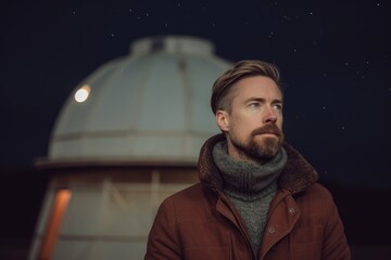 Medium shot portrait photography of a satisfied man in his 30s that is wearing a chic cardigan against a captivating astronomy observatory with stargazers background .  Generative AI