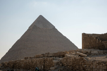 A picture of the Great Pyramid from the side in the ancient Pharaonic pyramids area in Egypt, Giza