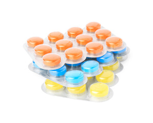 Blisters with cough drops isolated on white