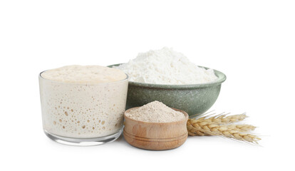 Leaven, flour, and ears of wheat isolated on white