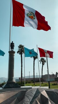 Peruvian Flag and Callao Municipal Flag Flying High in Unison