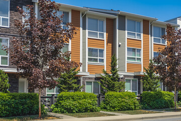 New Modern Apartment Buildings in Vancouver BC. Canadian modern residential architecture on sunny summer day