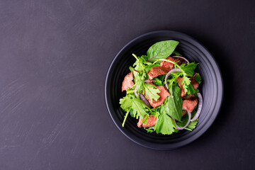 Beef salad with green vegetables Grilled beef salad Thai food Healthy beef salad menu with pepper, garlic, spices Lunch Dinner