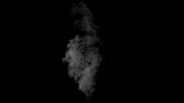 White smoke,steam on a black background.
Slow motion. Shot in 4K resolution at 120fps.
