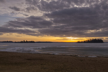Fototapeta premium A Colorful Sunset over Frozen Astotin Lake