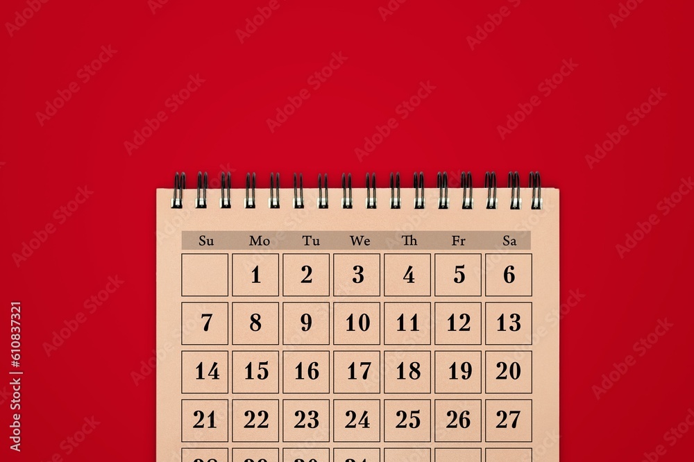 Wall mural 2023 Month desk calendar on red background.