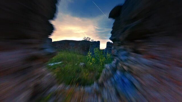 Aerial view of ancient ruins at sunset. 4K